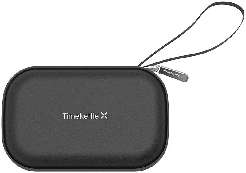 Закритий кейс Timekettle X1, вид зверху з логотипом і ремінцем
